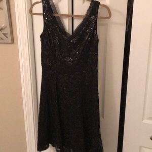 Fun and sparkly black cocktail dress